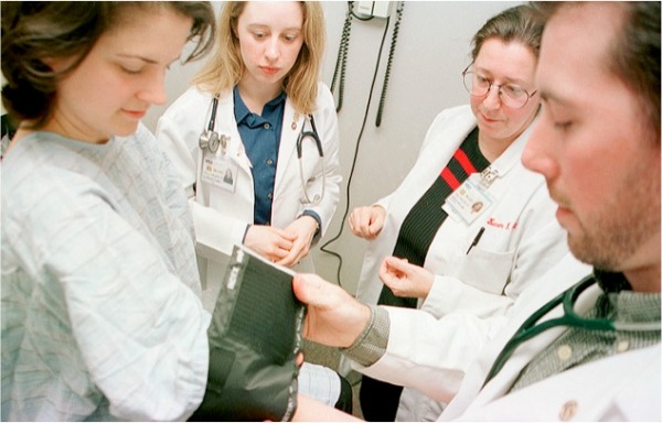 High Paying Medical Jobs Without Medical School. Medical School students performing a physical test.